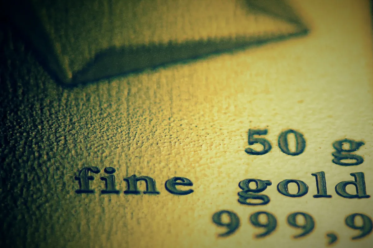 Macro of a gold bar stamped 50 g fine gold 999.9